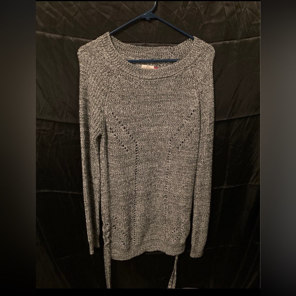 I am selling a gray Long Sleeve Women’s Blouse.
